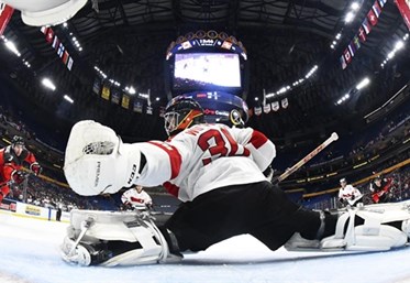 BUFFALO, NEW YORK - JANUARY 2: Canada's Conor Timmins #3 with a scoring chance against Switzerland's Philip Wuthrich #30 during quarterfinal round action at the 2018 IIHF World Junior Championship. (Photo by Matt Zambonin/HHOF-IIHF Images)

